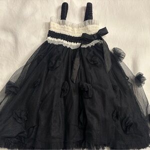 Elegant Black and White Dress with Tulle Accents
